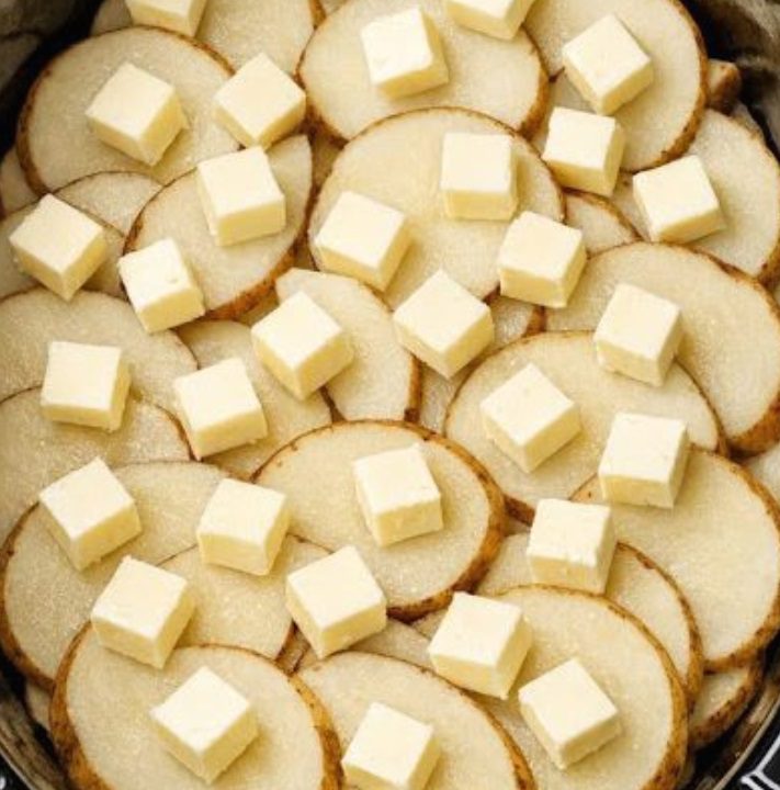 Toss raw sliced russet potatoes into the slow cooker with just 3 other ingredients and somehow you get a cozy dinner your family will ask for again.