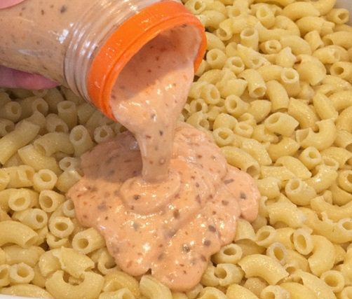 Pour thousand island dressing and these 3 ingredients over elbow macaroni into a baking dish for a creamy summer dish that becomes an instant family favorite